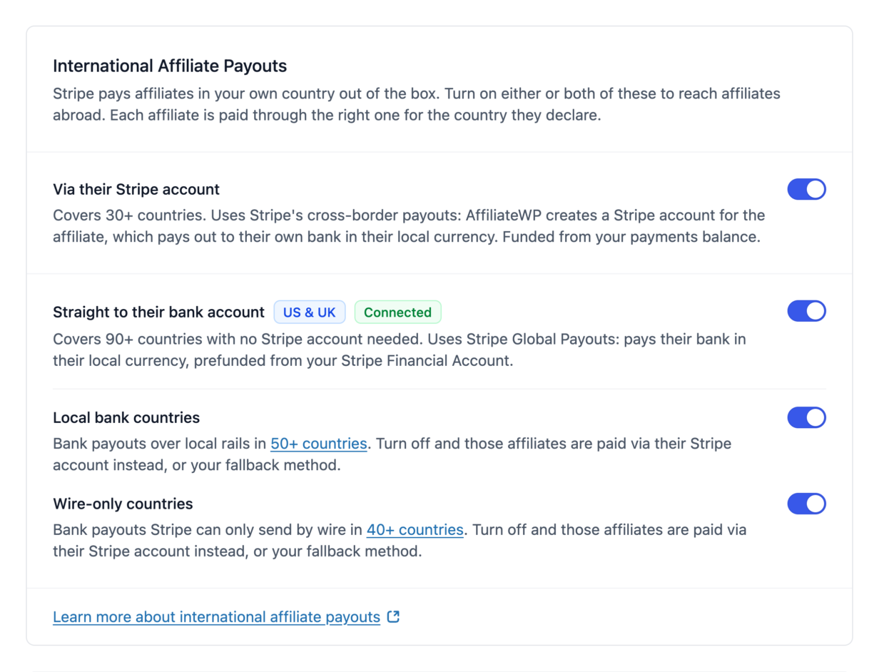 The International Affiliate Payouts group in AffiliateWP settings, with both options on and the Local bank countries and Wire-only countries toggles showing