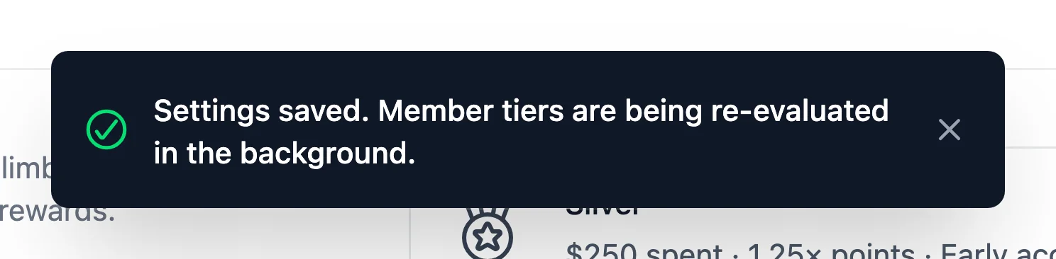 Settings saved message saying member tiers are being re-evaluated in the background