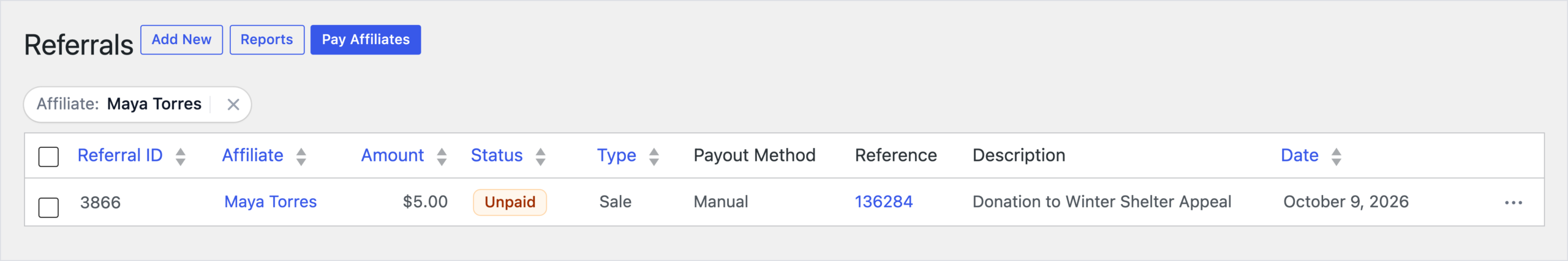 Tela de Indicações do AffiliateWP com uma indicação Não Paga de R$5,00 para Maya Torres descrita como Doação para Winter Shelter Appeal, com o ID da doação Charitable como referência